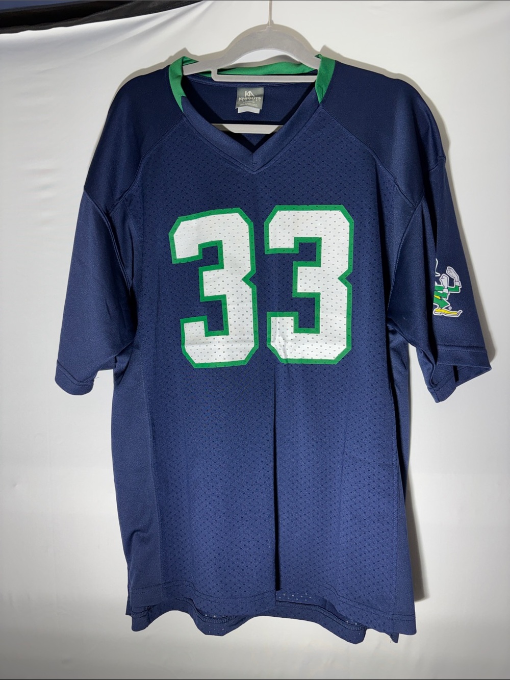 Knights Apparel Navy Jersey with Green Trim